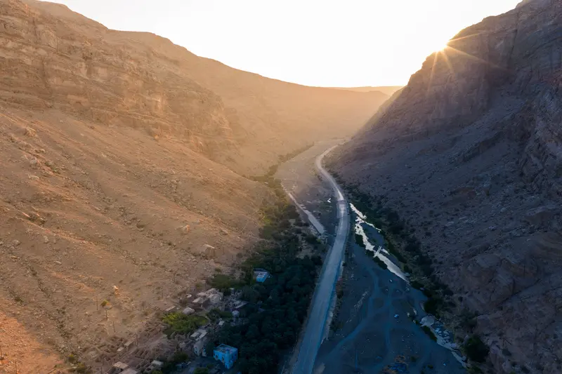 Sunstar Over the Wadi Road